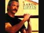 Il testo della She made a man out of a mountain of stone Aaron Tippin