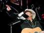 Il testo della Three minute positive not too country up - tempo love song Alan Jackson