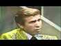 Il testo della Hangin' on to what i got Buck Owens