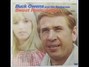 Il testo della Leave me something to remember you by Buck Owens