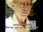 Il testo della You're the sad in my song Charlie Louvin