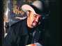 Paroles de I've got a tiger by the tail Daryle Singletary