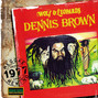 Il testo della Here i come Dennis Brown
