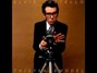 Paroles de The beat Elvis Costello