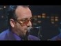 Il testo della There's a story in your voice Elvis Costello
