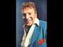 Lyrics of Blue eyes crying in the rain Ferlin Husky
