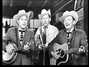Lyrics of Dim lights thick smoke Flatt And Scruggs