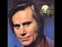 Il testo della She hung the moon George Jones