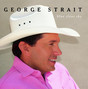 Paroles de She knows when you're on my mind George Strait
