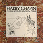 Paroles de The parade's still passing by Harry Chapin