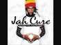 Il testo della Dem na build great man Jah Cure