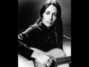 Lyrics of When you hear them cuckoos hollerin' Joan Baez