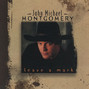 Paroles de Cover you in kisses John Michael Montgomery