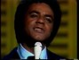 Il testo della Yellow roses on her gown Johnny Mathis