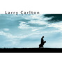 Il testo della Roll with it Larry Carlton