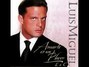 Il testo della Dimelo en un beso Luis Miguel