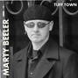 Il testo della Tuff town Marty Beeler