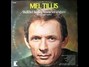 Il testo della What's the use in just me trying Mel Tillis