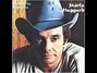 Paroles de I never go around mirrors Merle Haggard