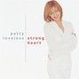 Il testo della She never stopped loving him Patty Loveless