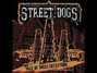 Il testo della Tale of mass deception Street Dogs
