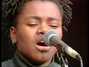 Lyrics of Behind the wall (live) Tracy Chapman