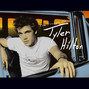 Il testo della Rollin' home Tyler Hilton