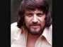 Il testo della I can't keep my hands off of you Waylon Jennings