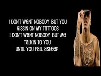 pochette album Kissin on my tattoos