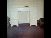 pochette album John plays drums