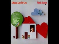 pochette album Woman lives for love